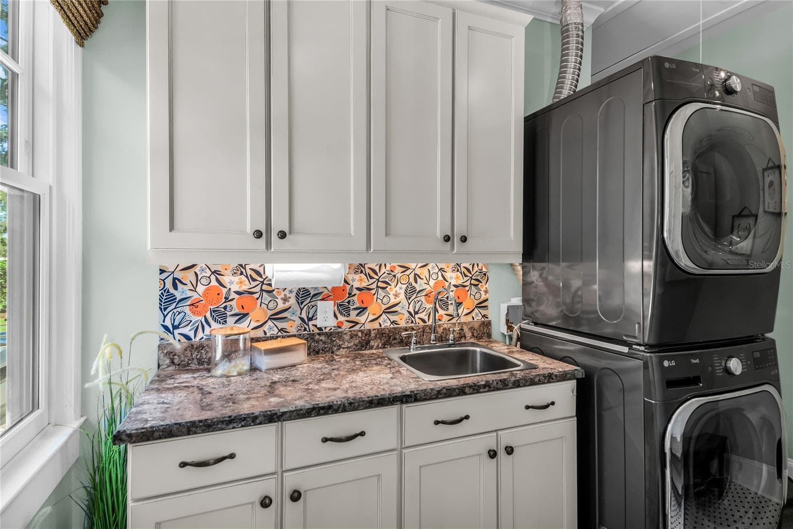 Laundry Room with sink, counterspace and cabinets for everday convenience - 234 N LAKEVIEW AVE, WINTER GARDEN