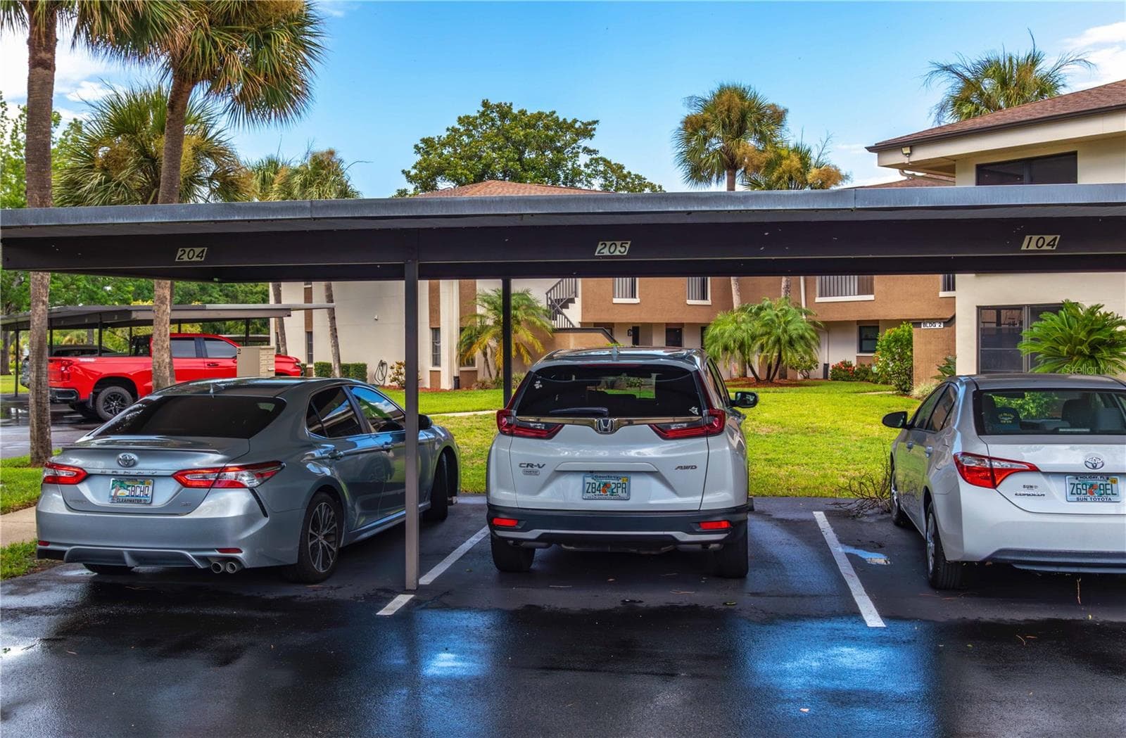 covered parking plus lots visitor parking - 2700 NEBRASKA AVE #2-205, PALM HARBOR