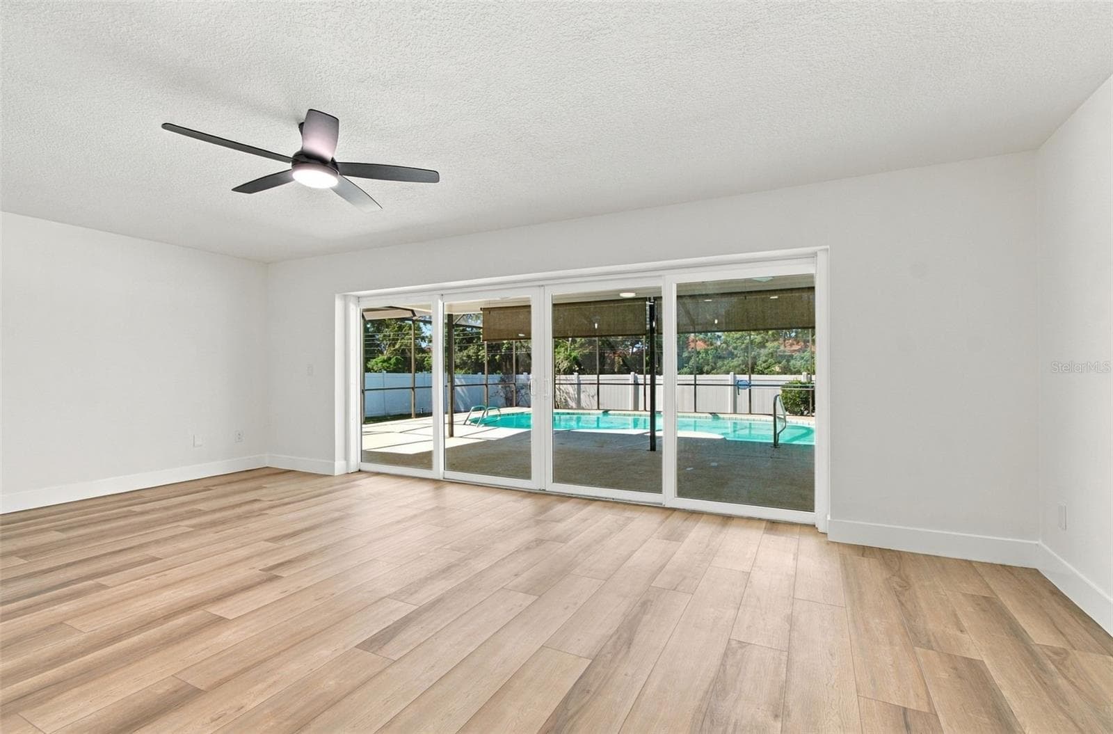 Kitchen area view of back patio area - 2942 CLUBHOUSE DR W, CLEARWATER