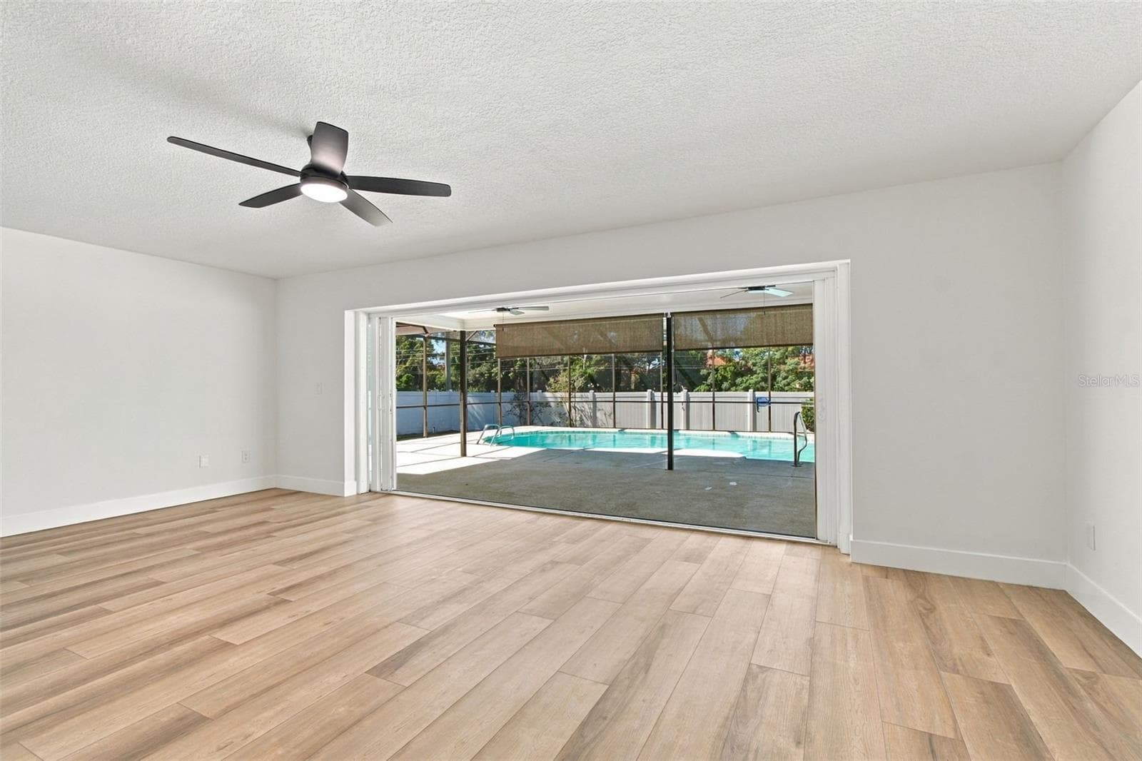 Cascading sliders open - 2942 CLUBHOUSE DR W, CLEARWATER
