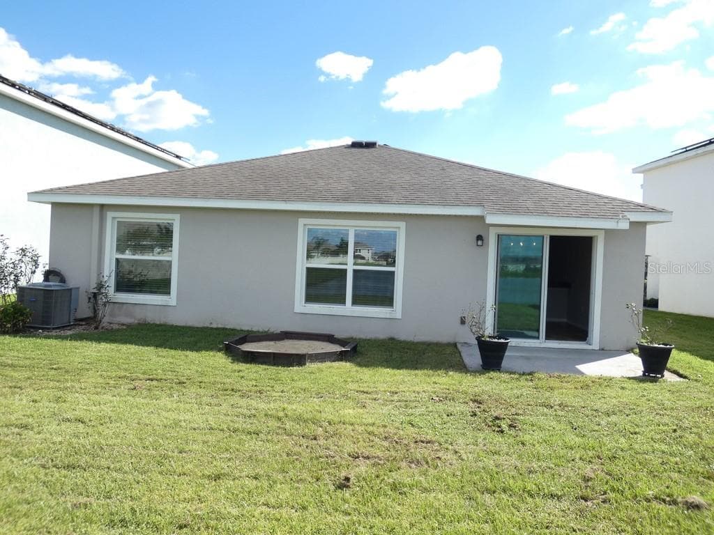 View of the Back of the Home: - ZEPHYR LAKES SUB, ZEPHYRHILLS
