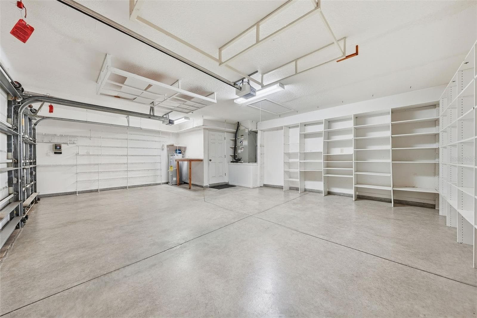 Oversized Garage with lots of Storage - 24809 RIVERBOAT BND, LEESBURG