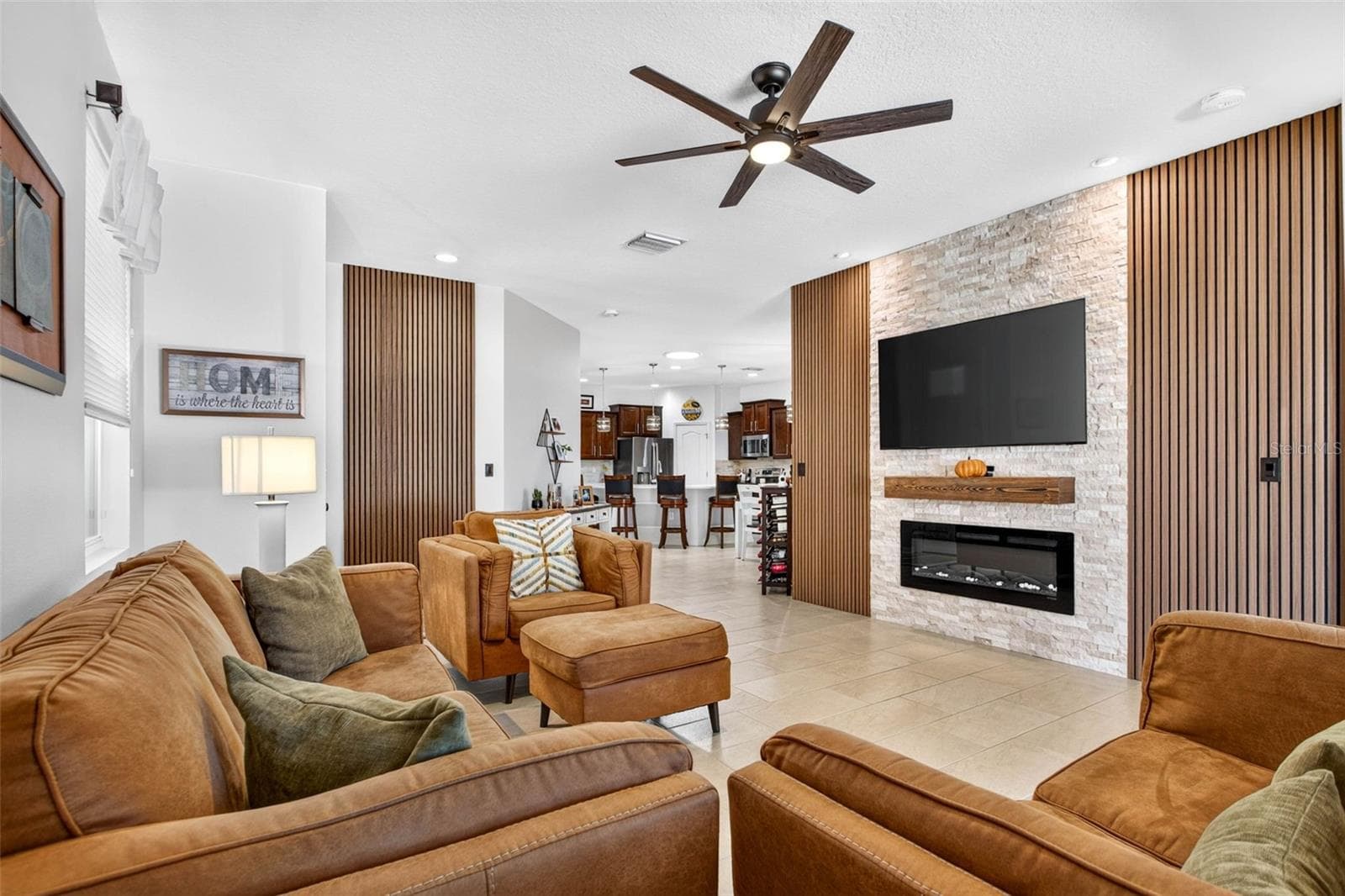 Accent wall compliments the space. - 32835 WOODTHRUSH WAY, WESLEY CHAPEL