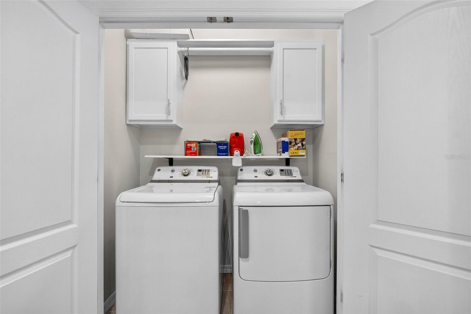 Laundry closet with addtl storage - 32835 WOODTHRUSH WAY, WESLEY CHAPEL