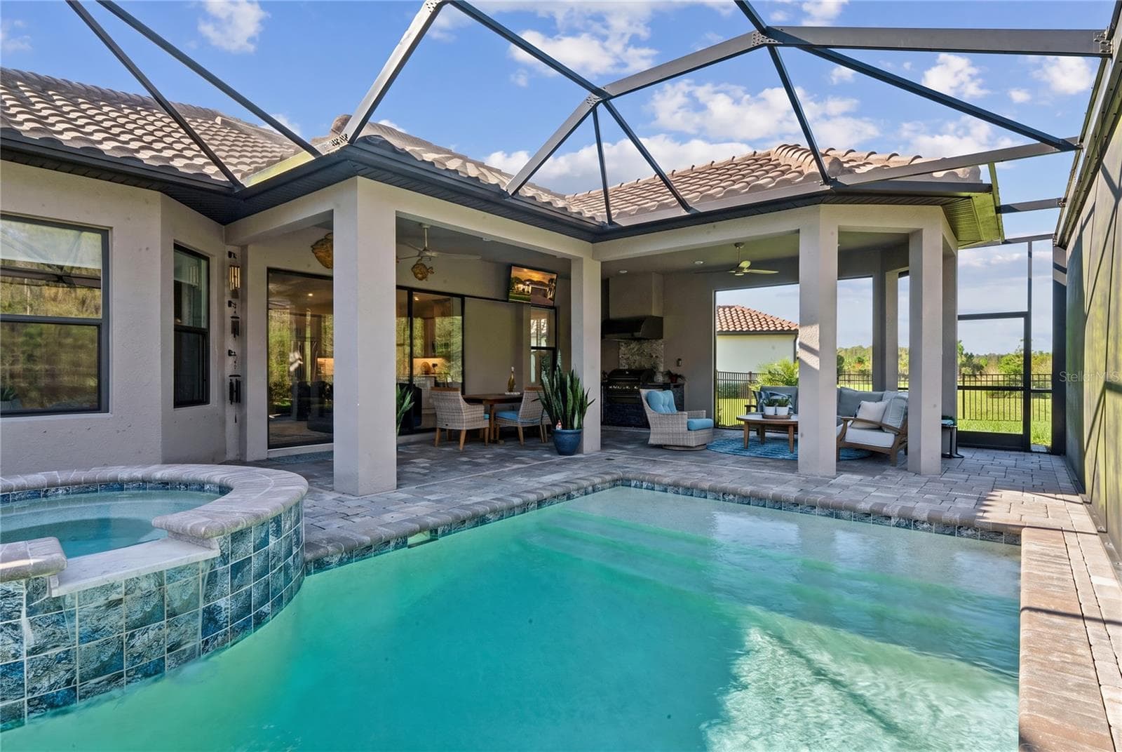 Saltwater pool and spa with shelf - 10813 CALLUNA DR, ODESSA