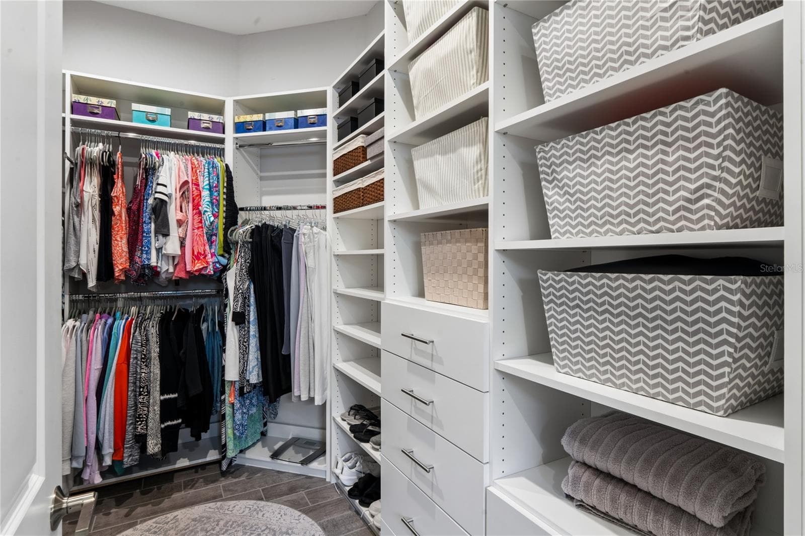 Primary Closet custom built-in with storage - 10813 CALLUNA DR, ODESSA