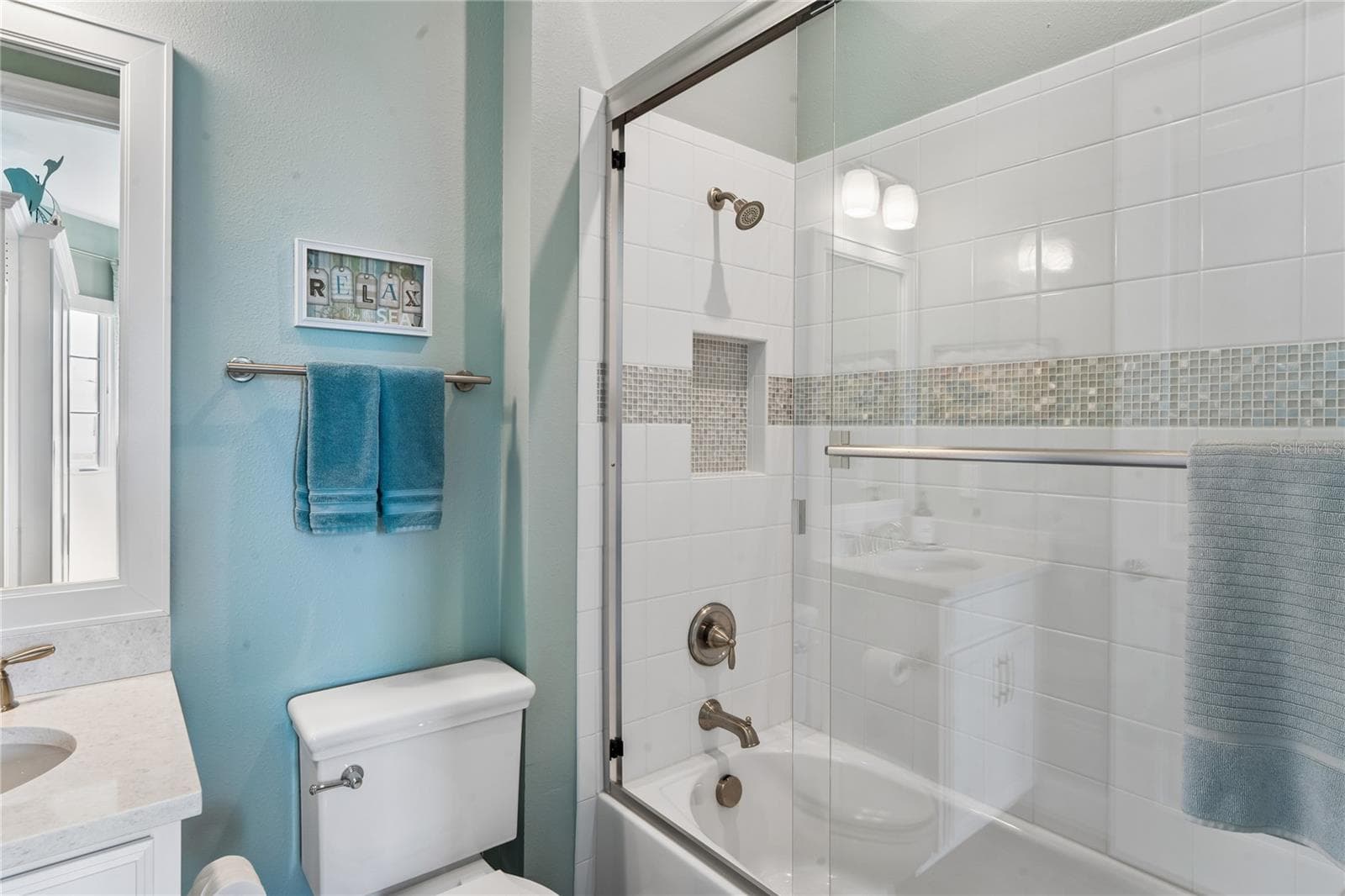 Bedroom 2 -en-suite bathroom w/ tub and glass shower doors - 10813 CALLUNA DR, ODESSA
