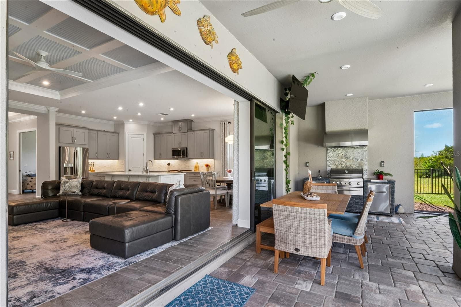 Pocket sliding glass doors for seamless entertaining - 10813 CALLUNA DR, ODESSA