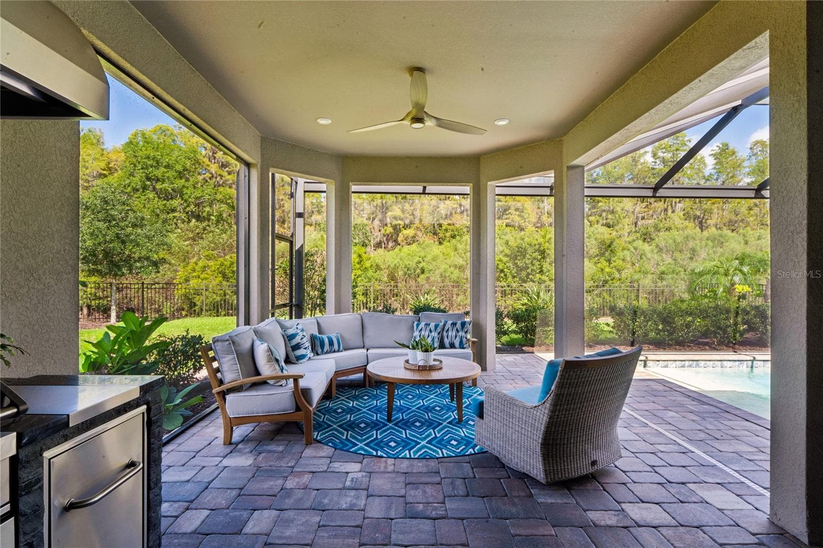 Outdoor covered living space w/ Teak furniture - 10813 CALLUNA DR, ODESSA