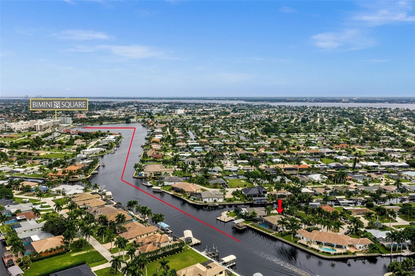 Just minutes by boat from Restaurants and shopping at Bimini Square - 5205 SUNSET CT, CAPE CORAL