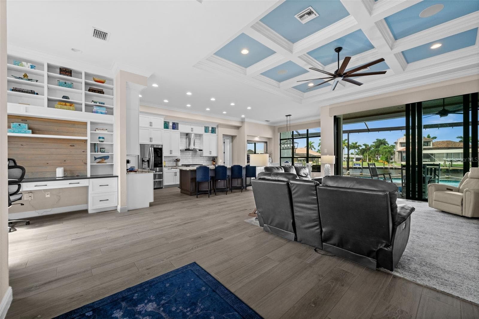 As you enter you are greeted with views straight through to the water - 5205 SUNSET CT, CAPE CORAL