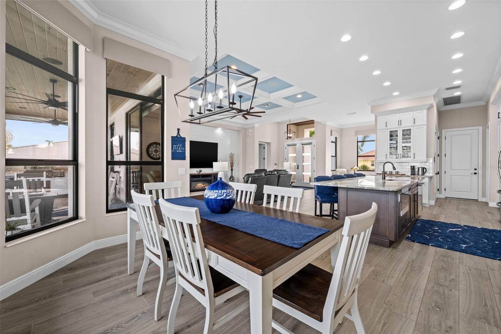 Dining area is open to the living areas - 5205 SUNSET CT, CAPE CORAL