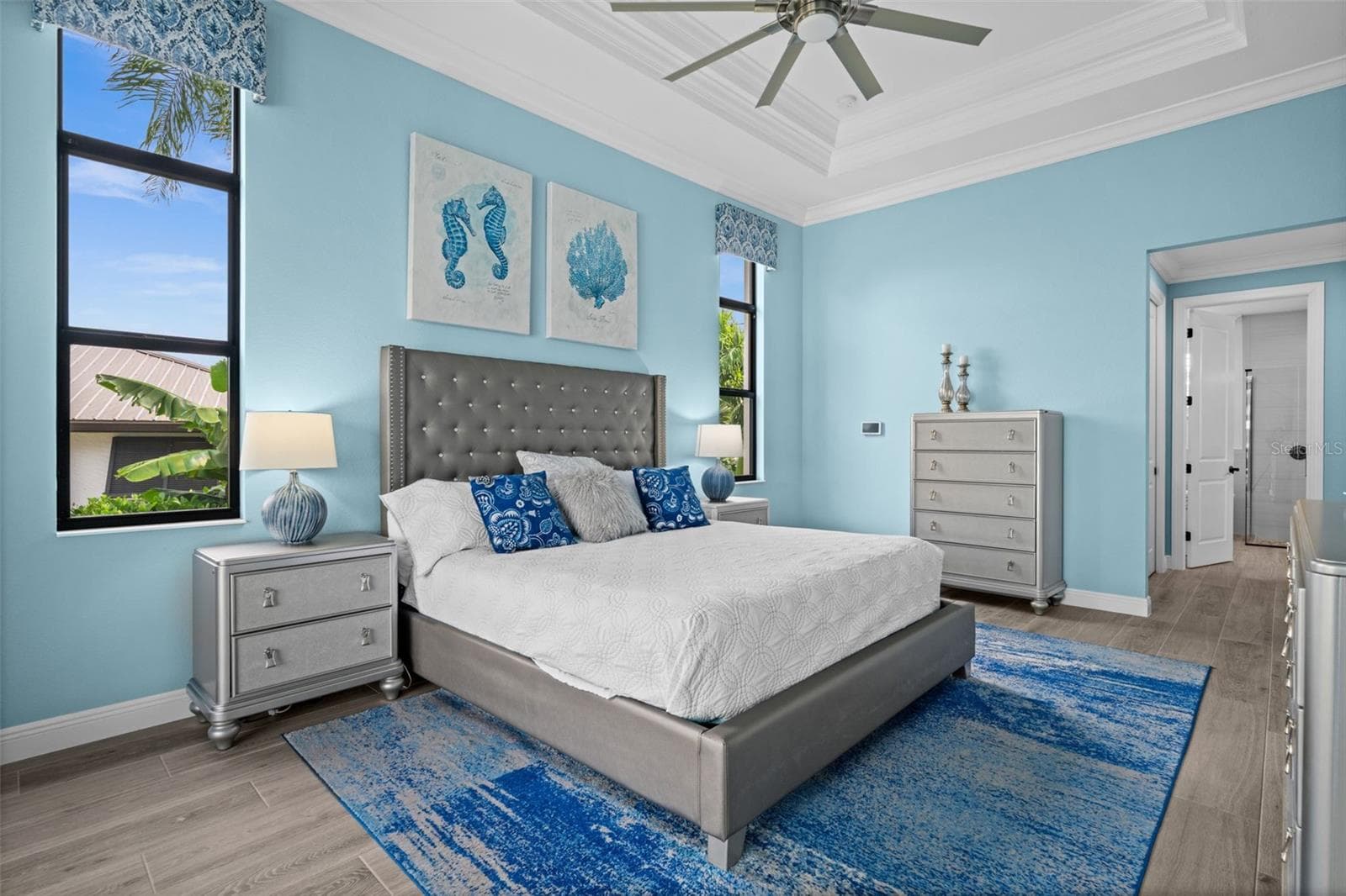Spacious primary suite with huge walk in closet and ensuite bath - 5205 SUNSET CT, CAPE CORAL