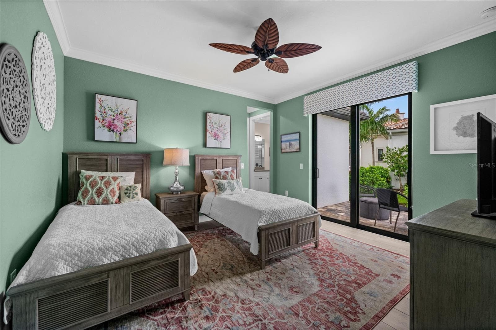 Bedroom 2 is a junior suite, with ensuite bath and it's own water view patio - 5205 SUNSET CT, CAPE CORAL