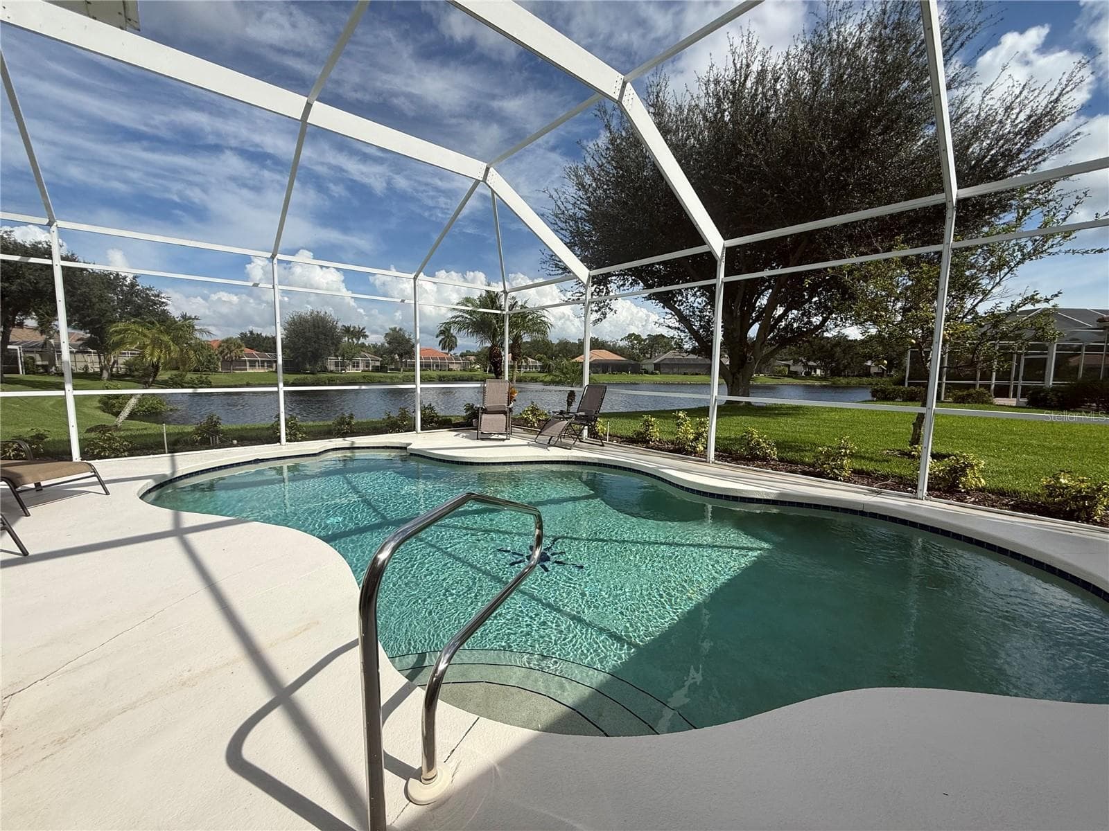 Pool and View of the Lake - 4120 LAKES CT, PORT CHARLOTTE