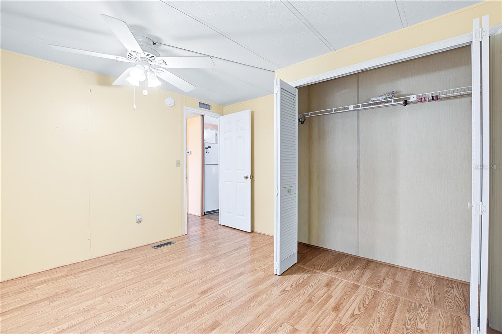 spacious closet in guest room - 5716 PAWNEE ST, ZEPHYRHILLS