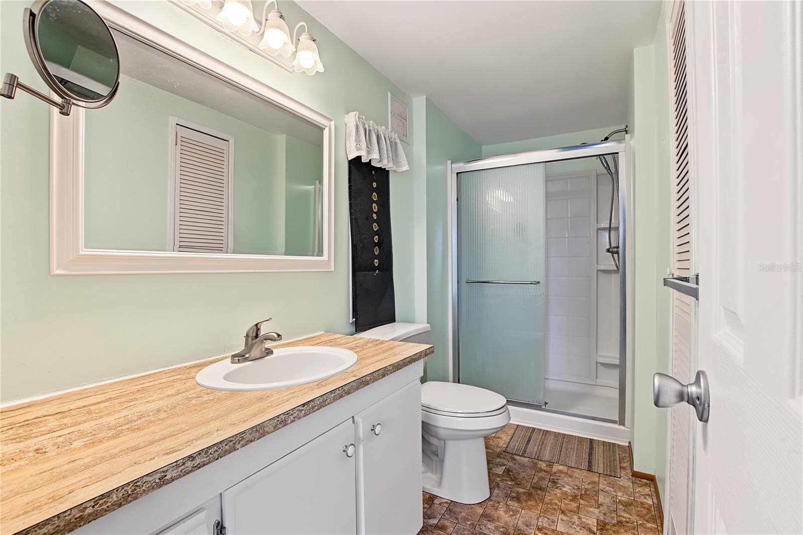 step in shower - 5716 PAWNEE ST, ZEPHYRHILLS