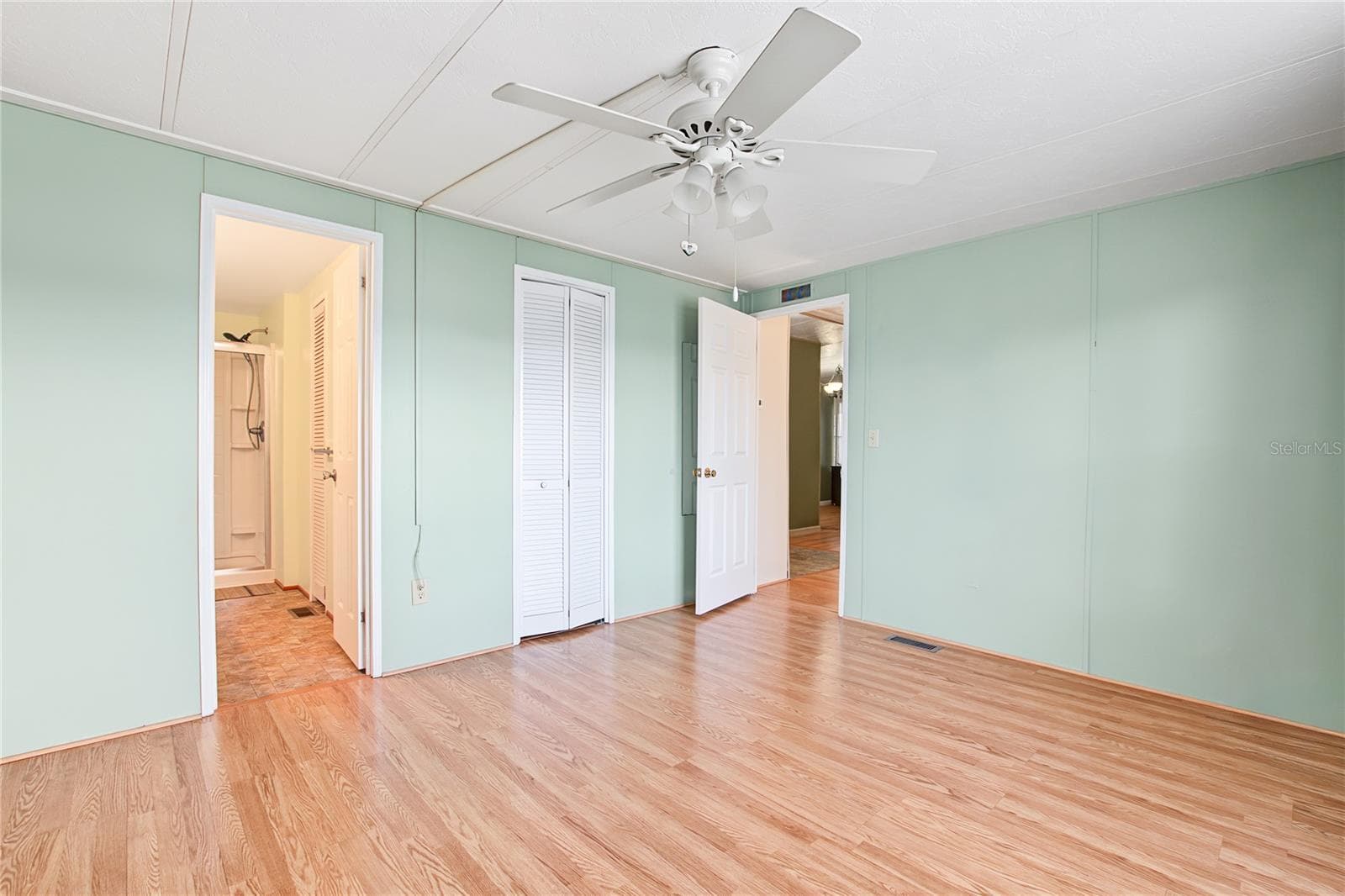 walk in closet - 5716 PAWNEE ST, ZEPHYRHILLS