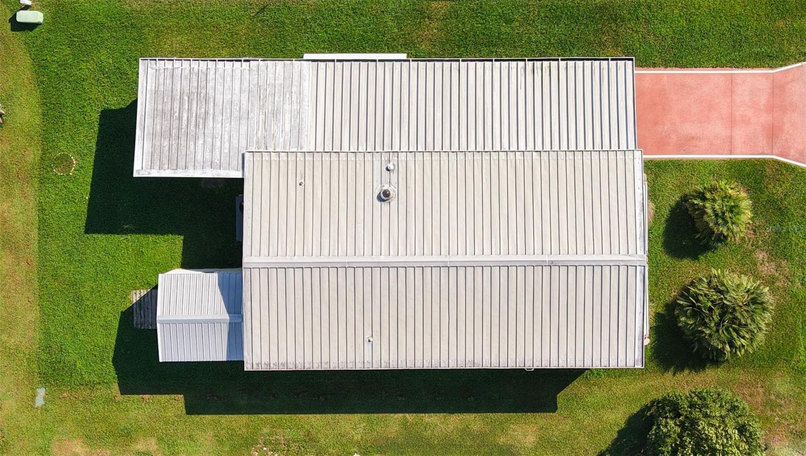 metal roof over. - 5716 PAWNEE ST, ZEPHYRHILLS