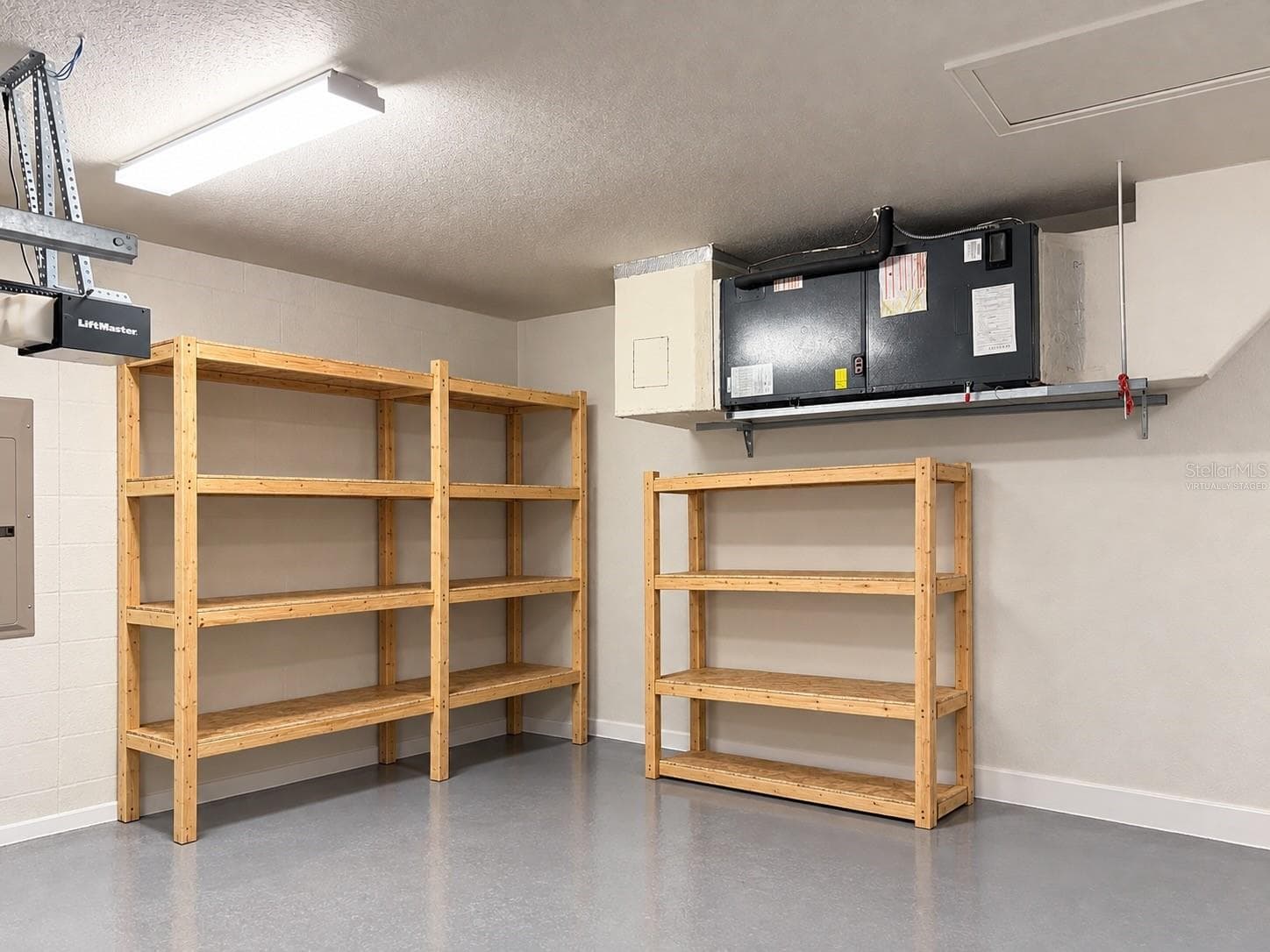 Virtually staged garage storage - 3339 PEARLY DR, LAKELAND