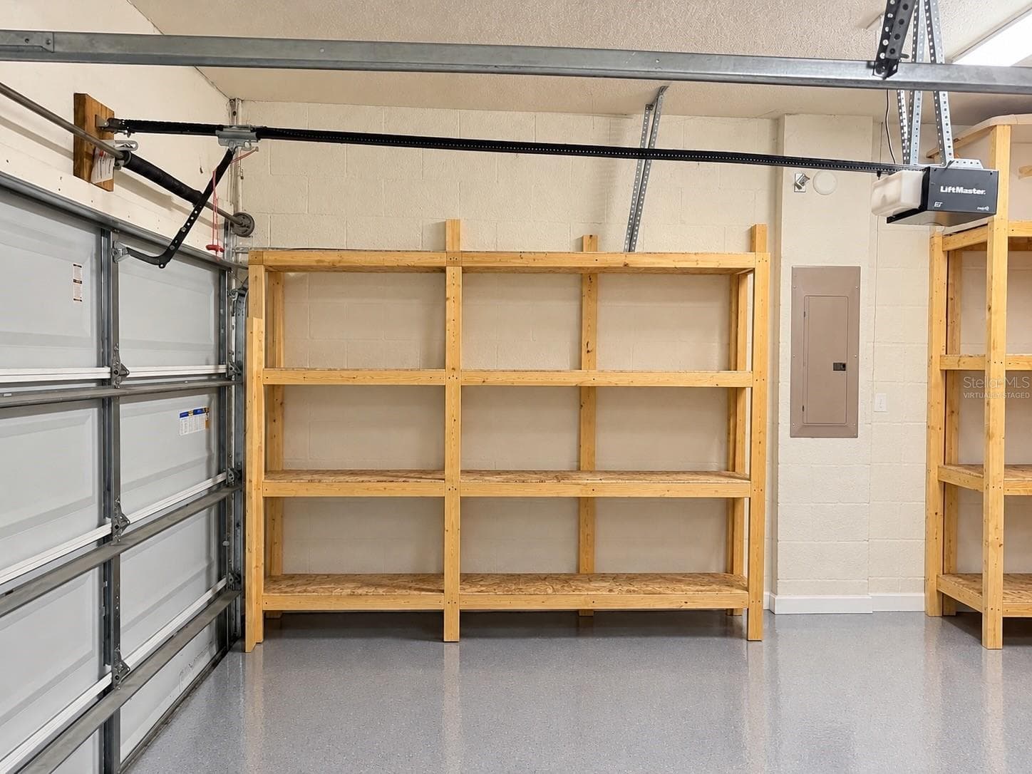 Virtually staged garage storage - 3339 PEARLY DR, LAKELAND
