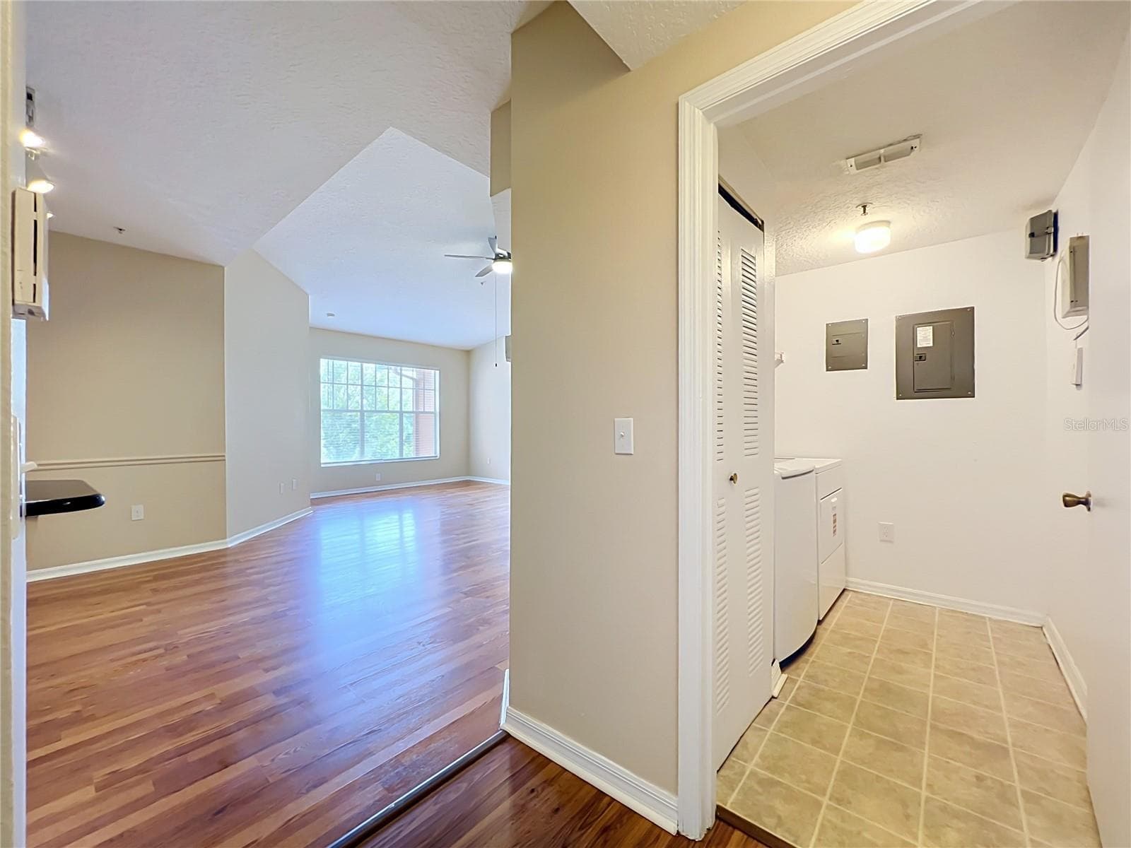 Family Room & Laundry Room - 5578 METROWEST BLVD #1-310, ORLANDO