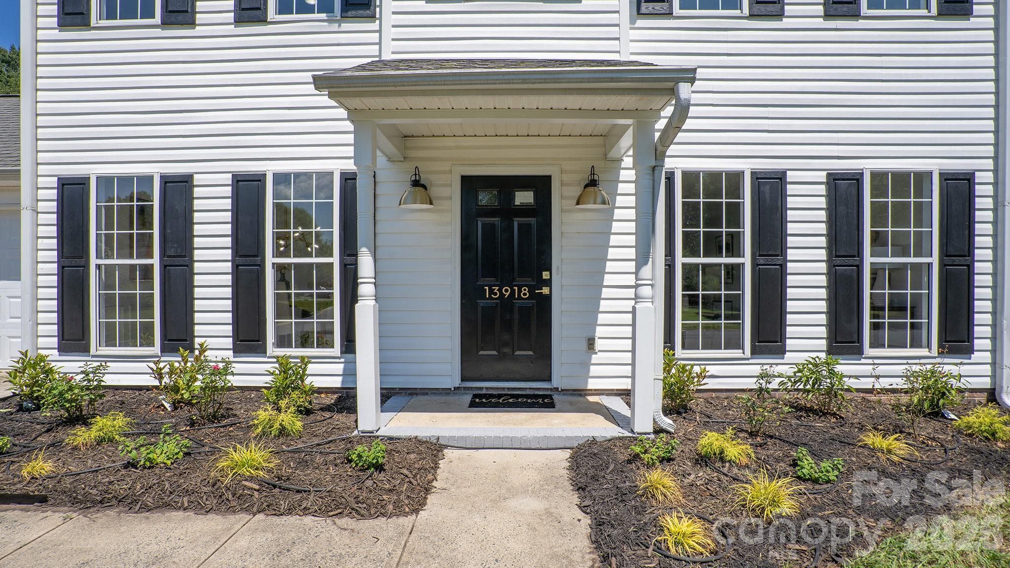 Low Maintenance Vinyl Exterior, Crisply Painted Shutters and Front Door, New Landscaping - 13918 Wild Heather Court, Charlotte