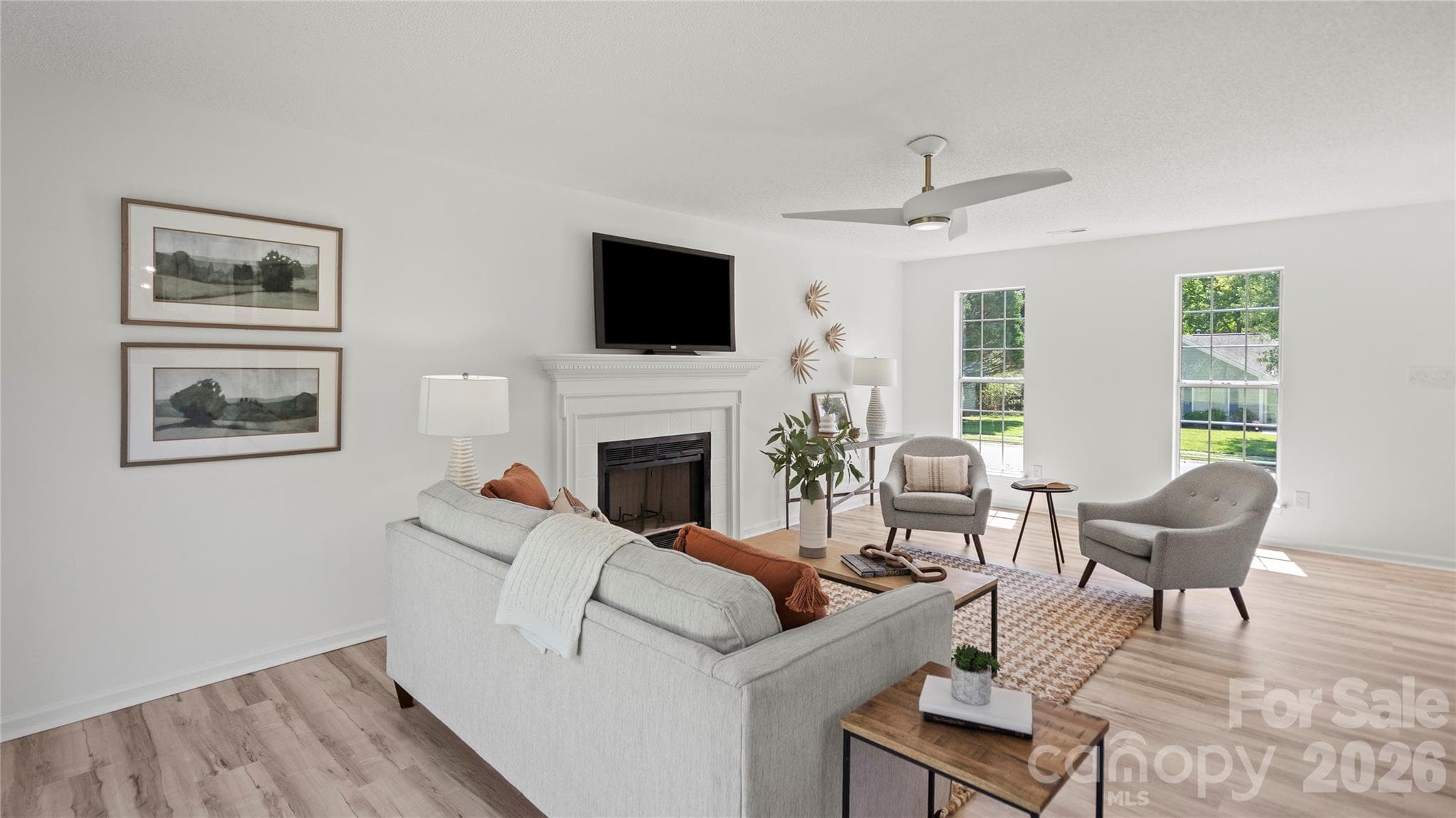 Gas Fireplace in Living Room and New Ceiling Fan - 13918 Wild Heather Court, Charlotte
