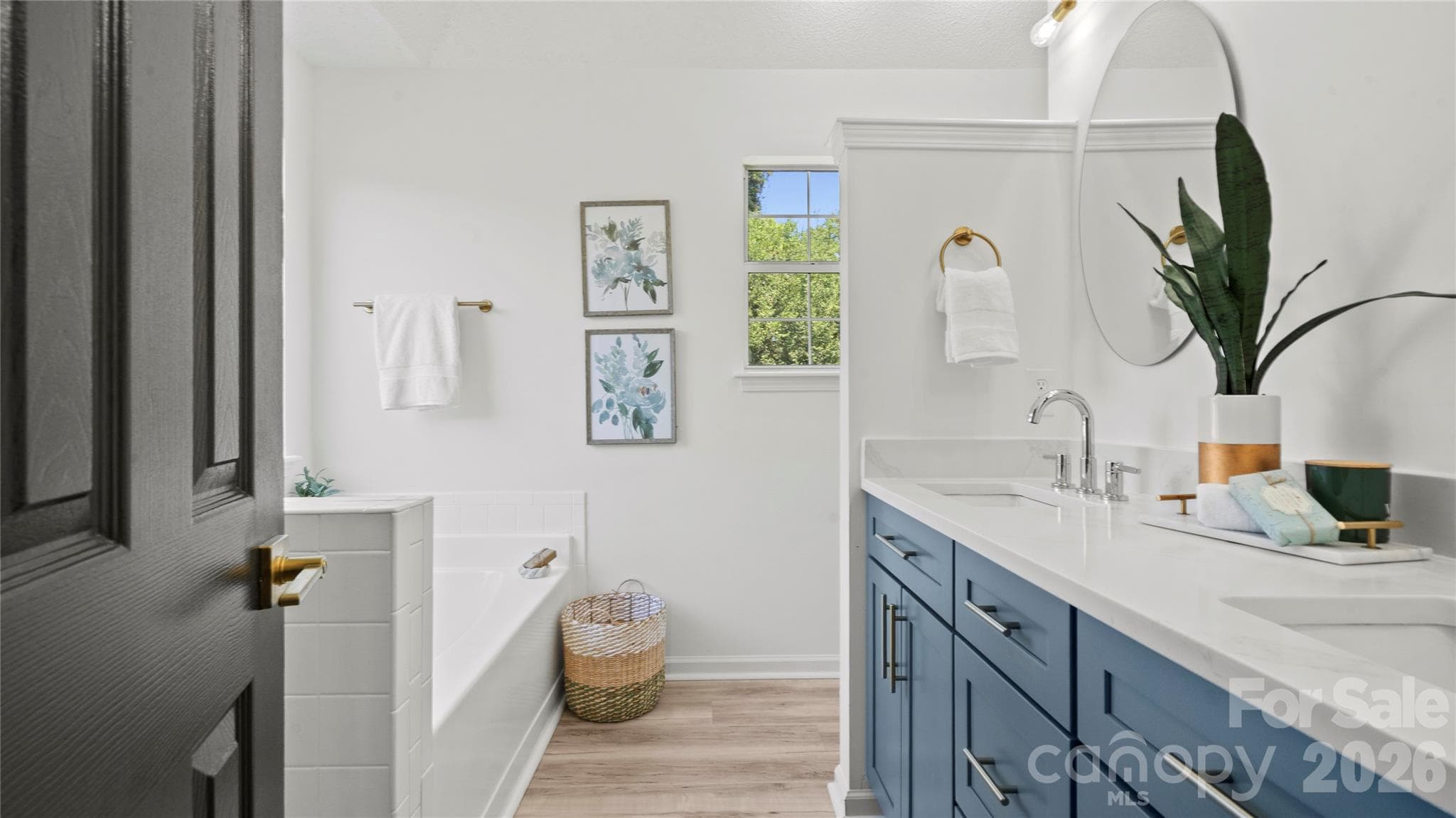 Primary Bathroom Boasts New Vanity and Quartz Countertops - 13918 Wild Heather Court, Charlotte