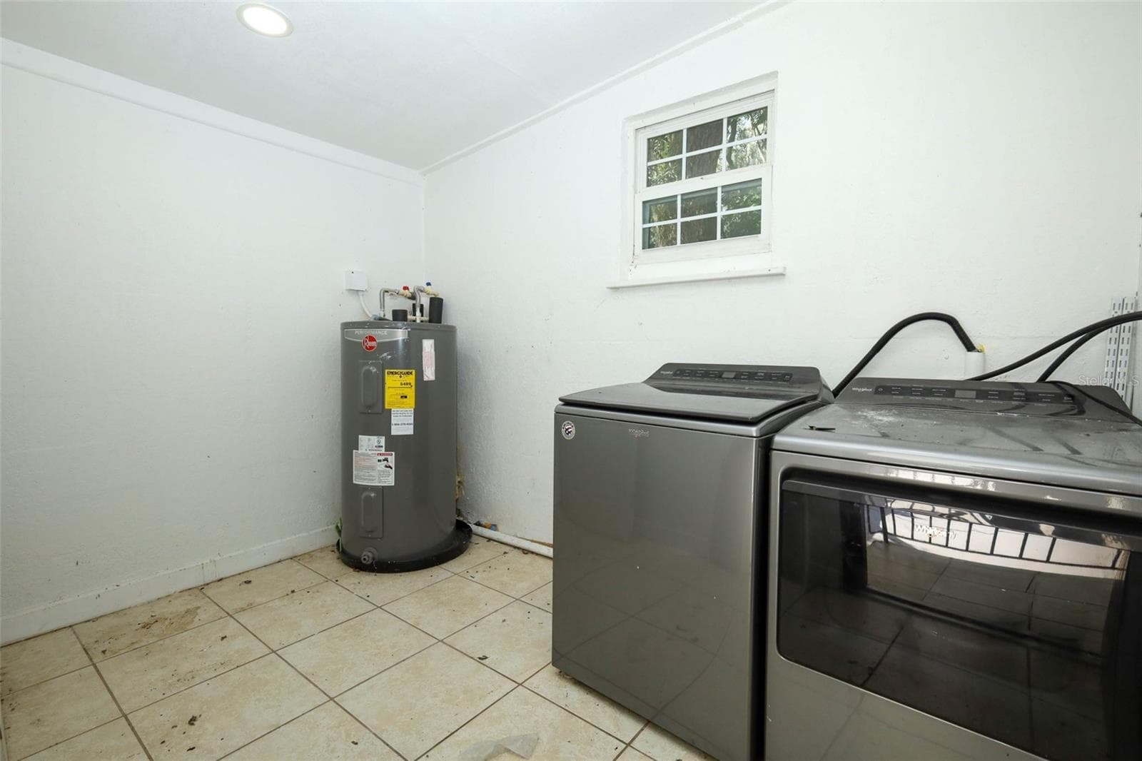 utility room behind carport - 7614 BELL BLVD, ORLANDO