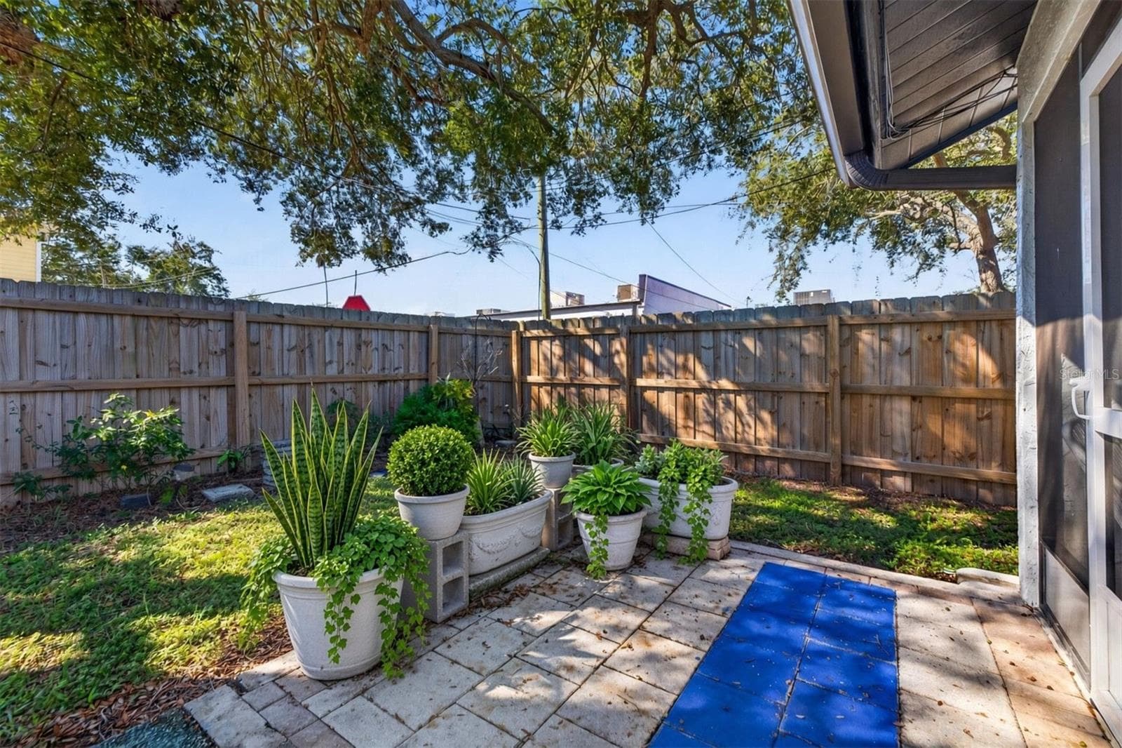 Nice back courtyard and side yard with gate. - 366 47TH AVE N #5, ST PETERSBURG