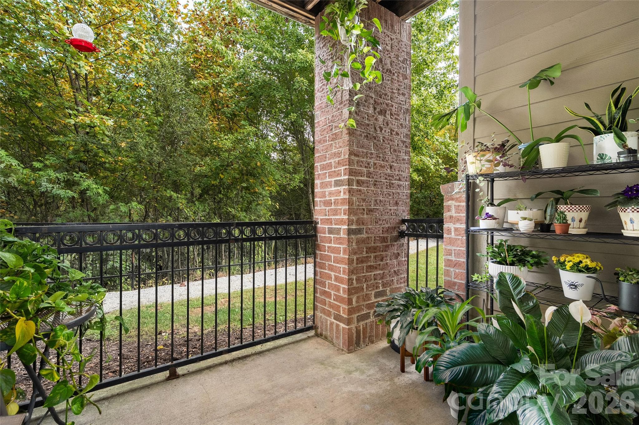 Covered patio. - 234 Brickton Village Circle, Fletcher