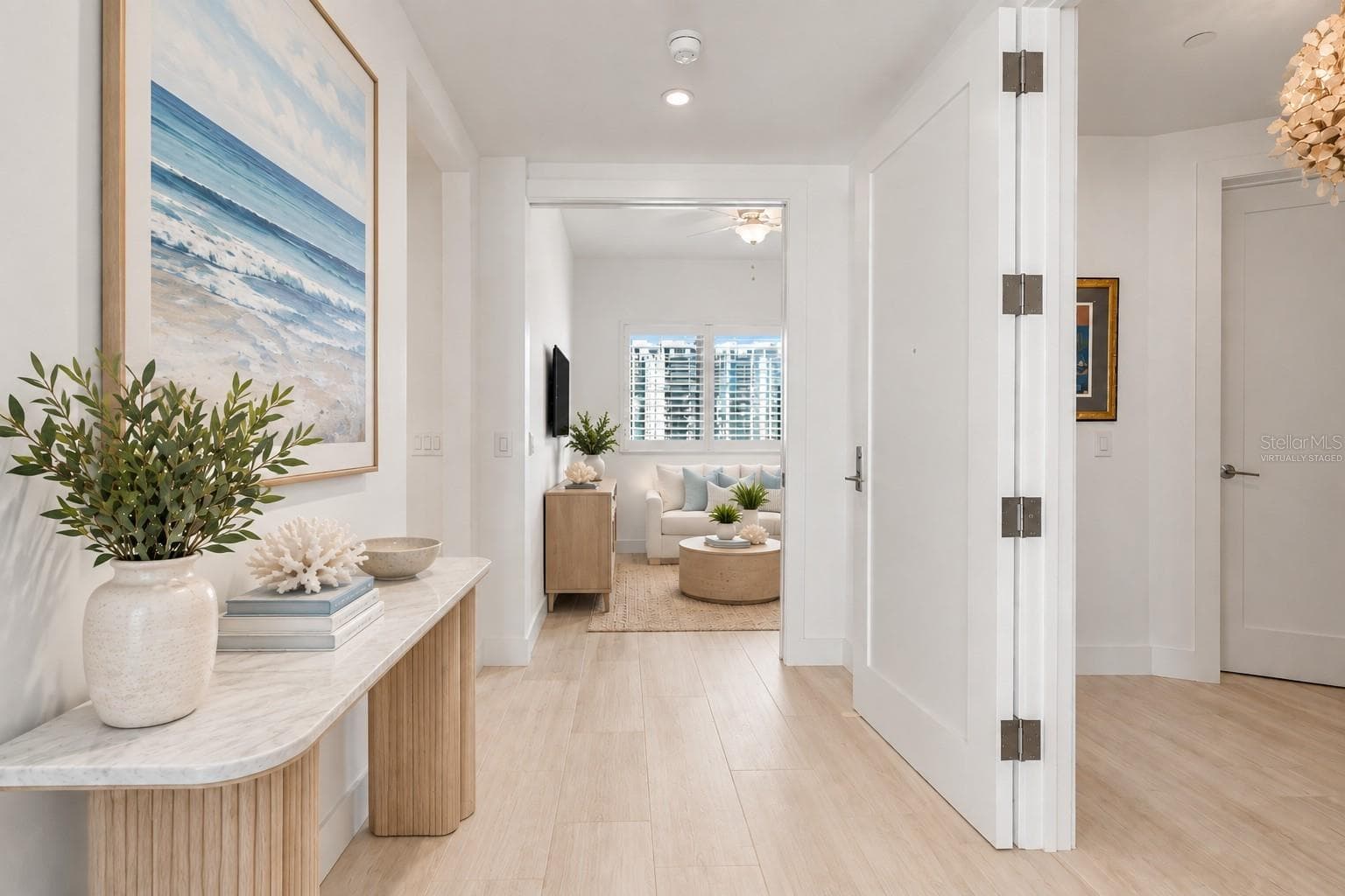 Virtually Staged- Entry Hallway to Den, Guest Bedroom and Full Guest Bathroom - 1155 N GULFSTREAM AVE #802, SARASOTA