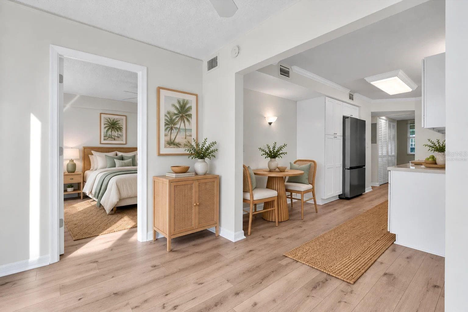 Virtually Staged: Florida Room Looking Towards Kitchen - 4885 1ST ST NE #106, ST PETERSBURG