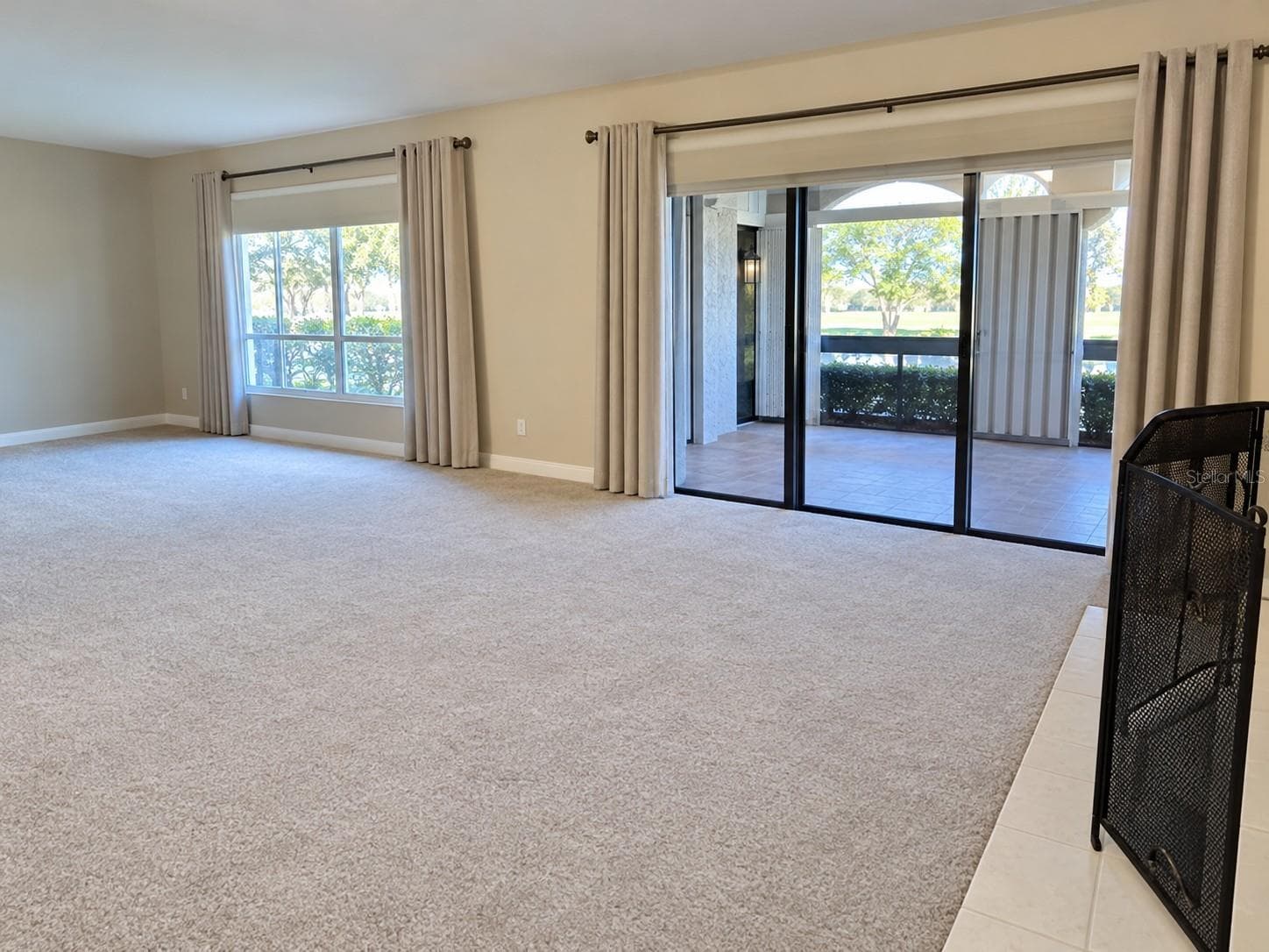 Access to Climate-Controlled Florida Room/Den - 100 S TREMAIN ST #G2, MOUNT DORA