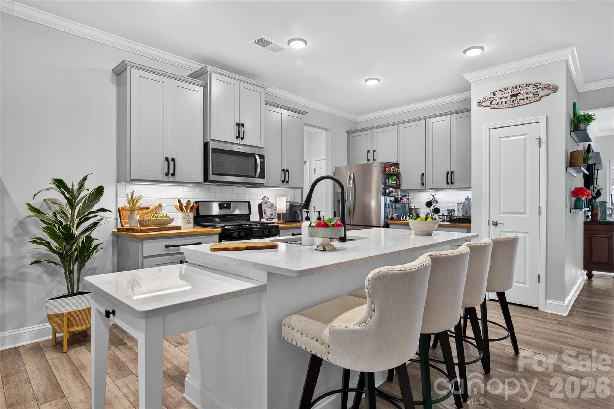 Large kitchen with expansive island - 4521 Grove Manor Street, Waxhaw