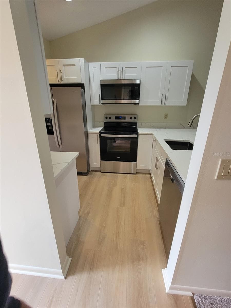 kitchen with all new appliances, new cabinets - 5204 MYRTLE WOOD #2, SARASOTA
