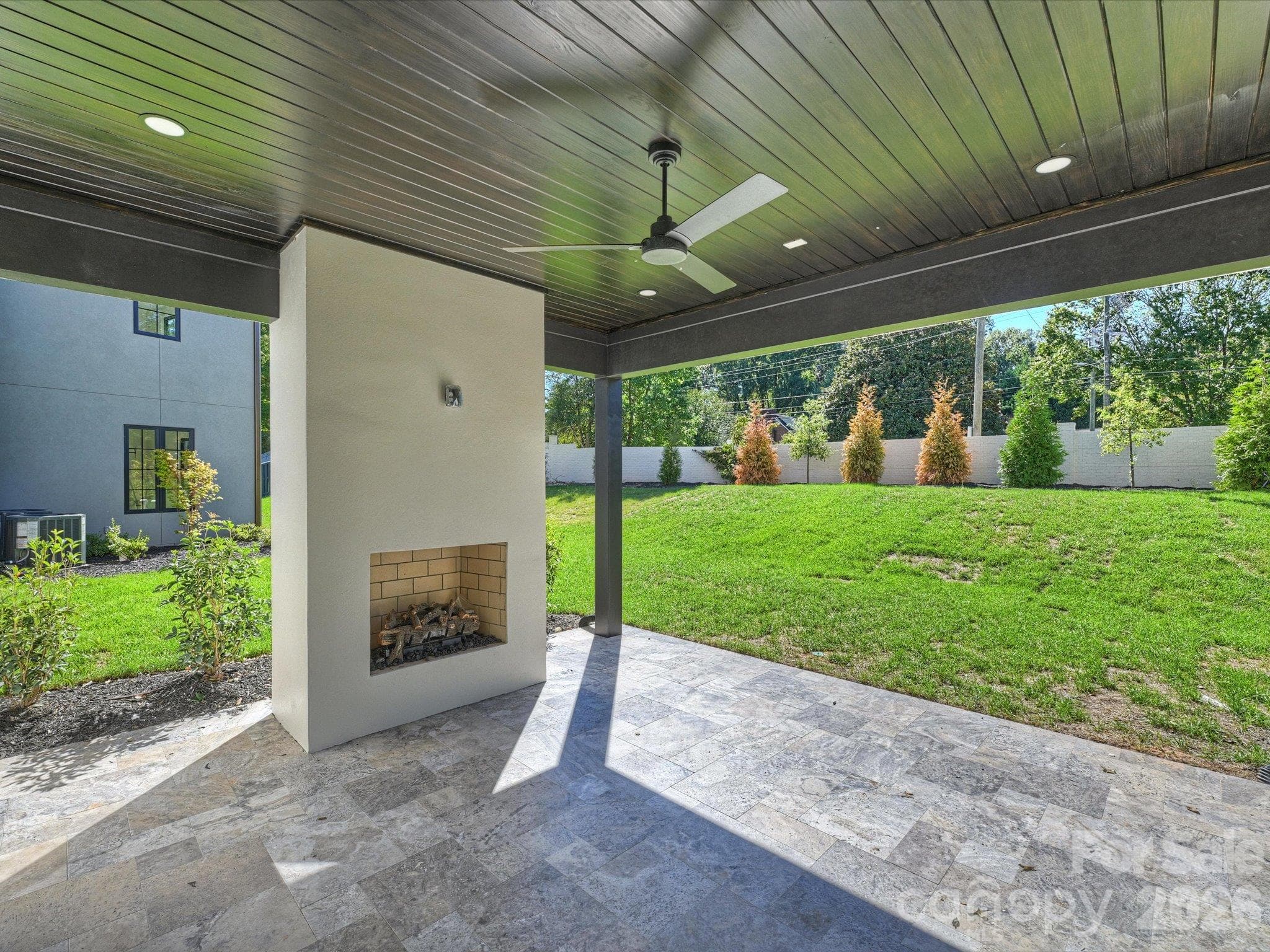 Spacious coverage terrace with gas fireplace - 927 Laurel Creek Lane, Charlotte