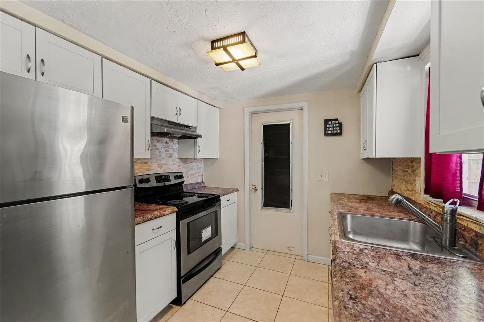 Single Family Residence at 5145 MANOR DR, NEW PORT RICHEY, photo 11 of 19