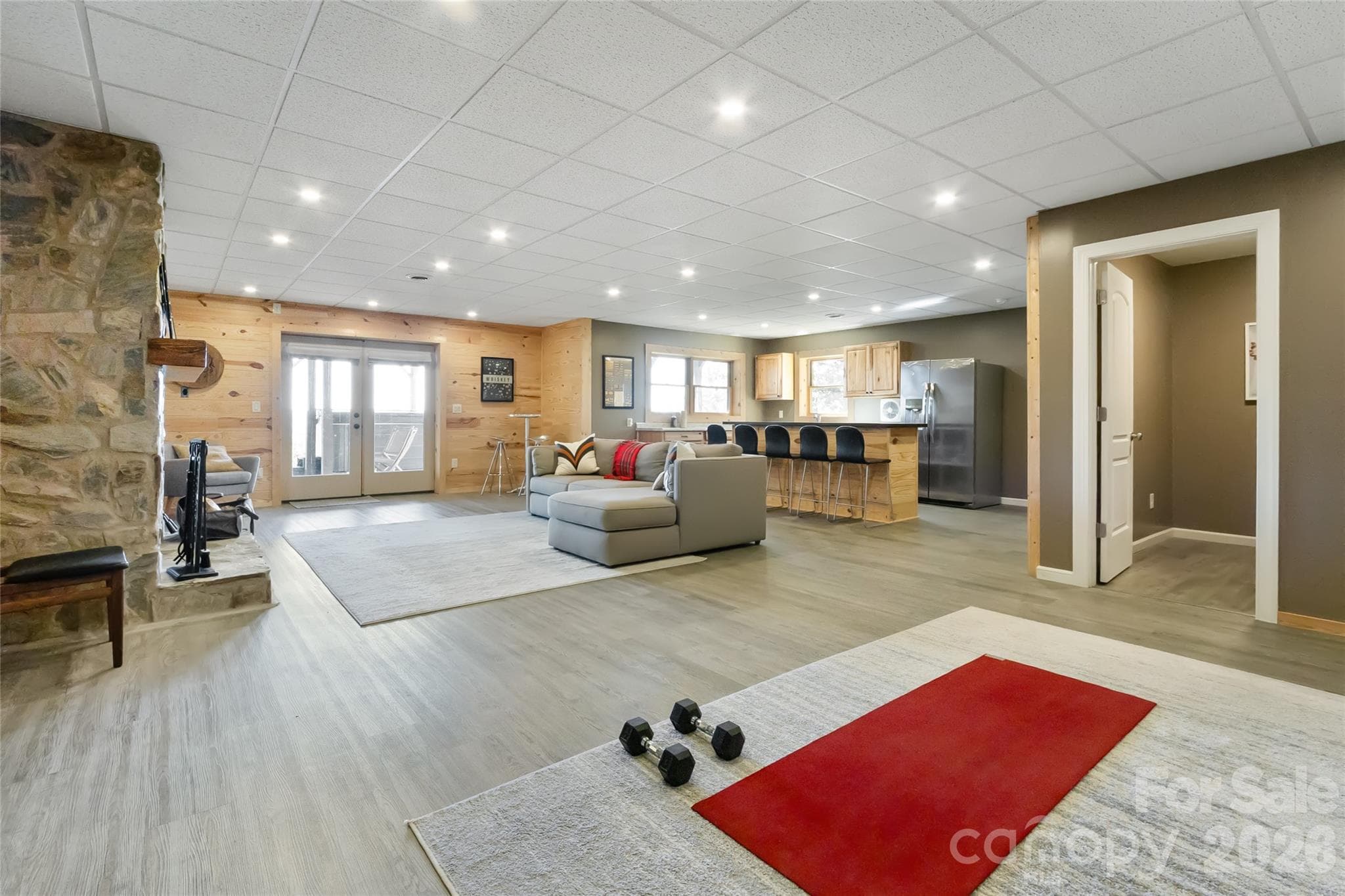 Lower Level - Living room with wood fireplace, kitchenette, bathroom - 656 Arbra Mountain Way, Bostic