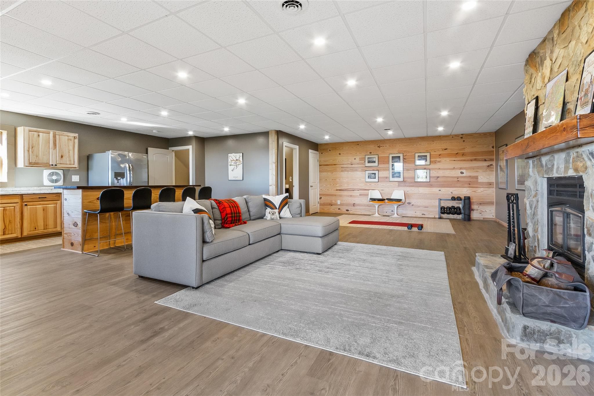 Lower Level - Living room with wood fireplace, kitchenette, bathroom - 656 Arbra Mountain Way, Bostic