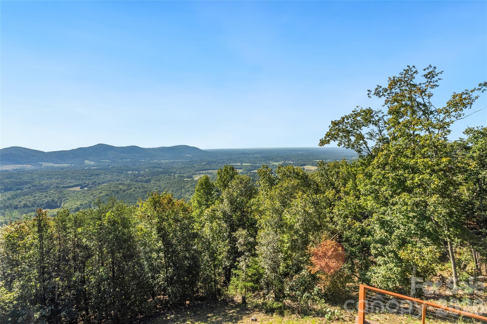 View from Main Level Deck - 40-60 mile views - sunset in middle of photo - 656 Arbra Mountain Way, Bostic