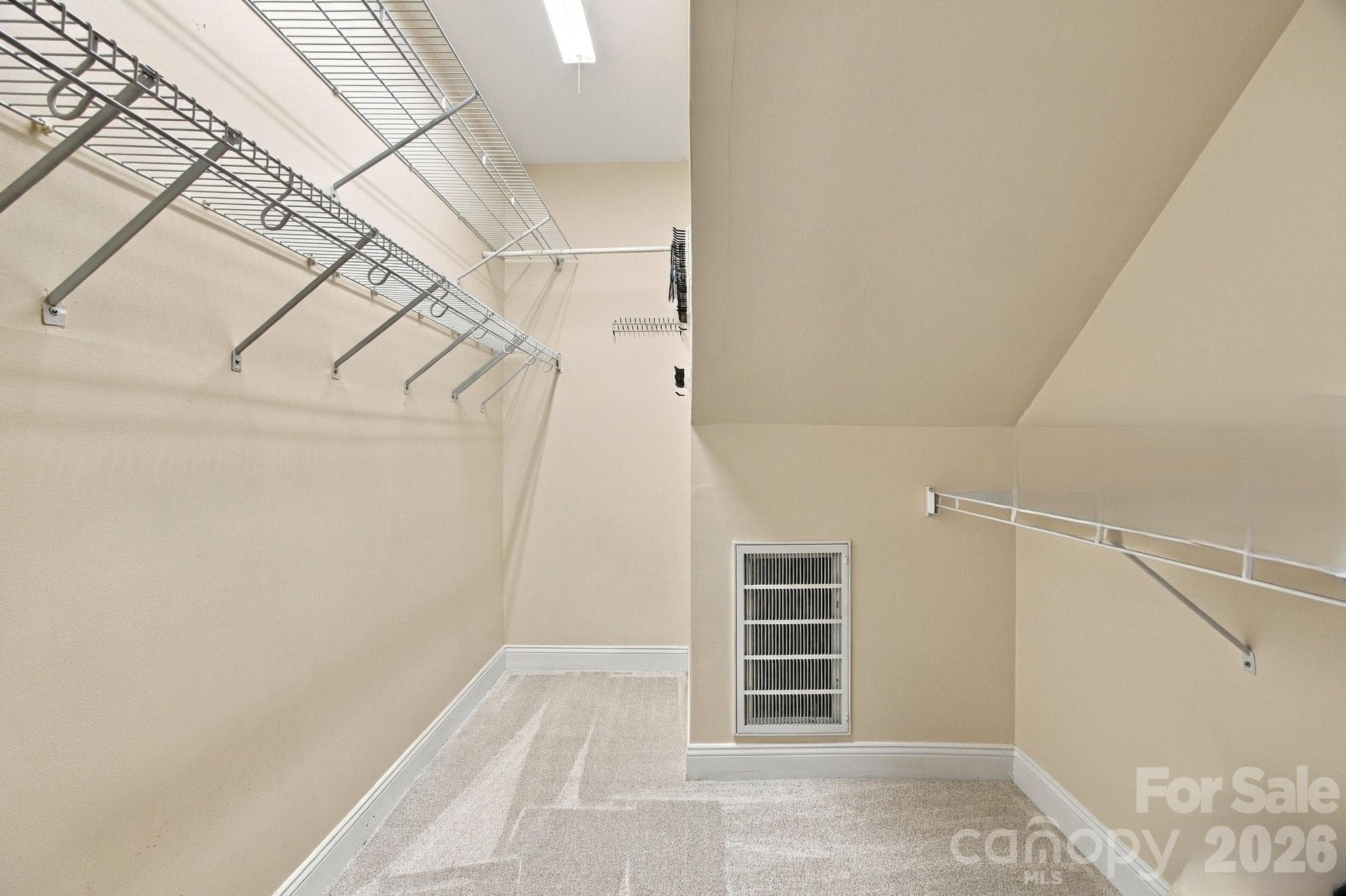 Primary bedroom walk-in closet. - 6611 Providence Road S, Waxhaw