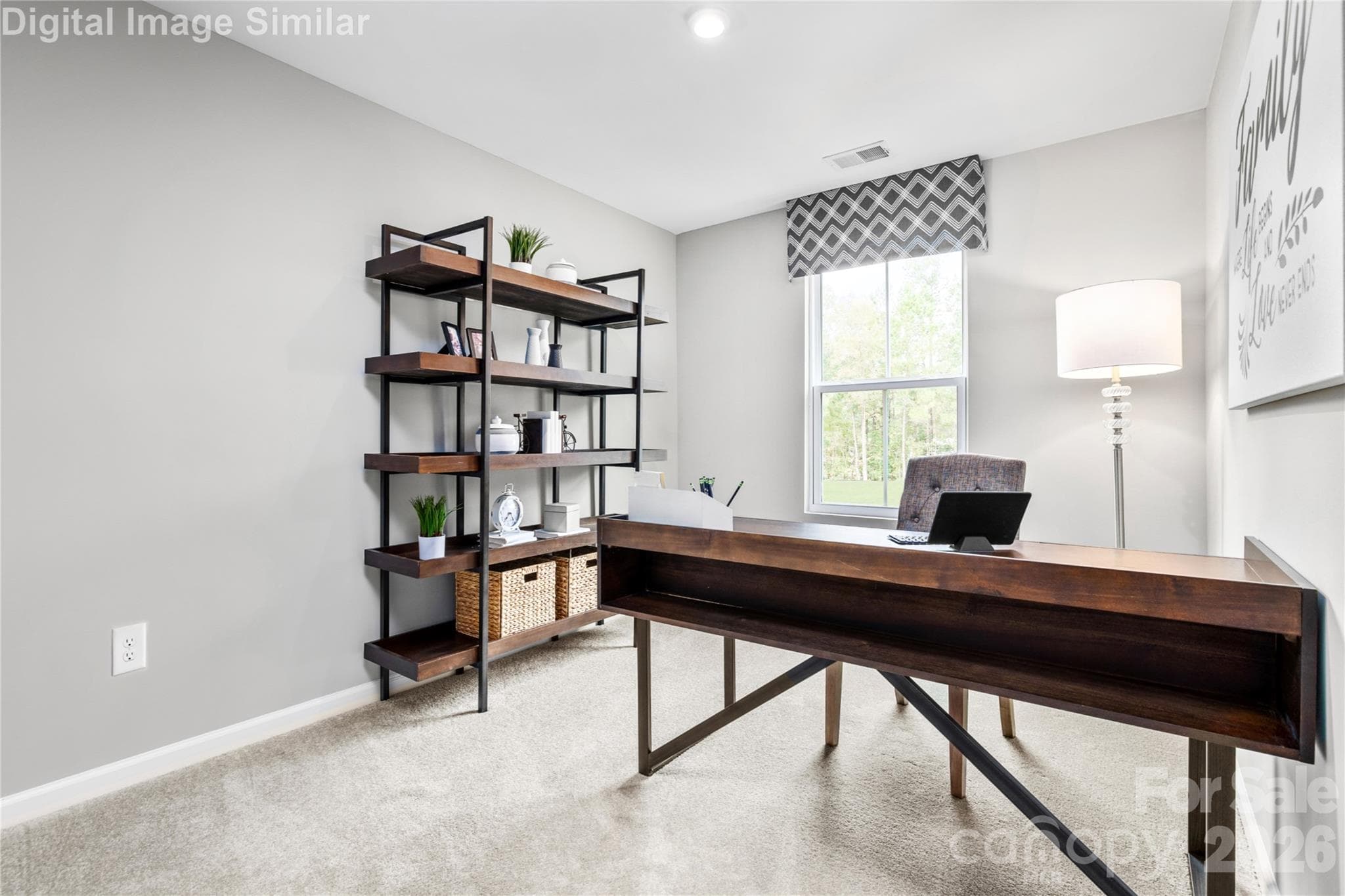 Bright, comfortable, and full of potential—this spacious second bedroom with a roomy closet is perfect for guests, work-from-home days, or your personal retreat. - 5215 Macvittie Lane, Charlotte
