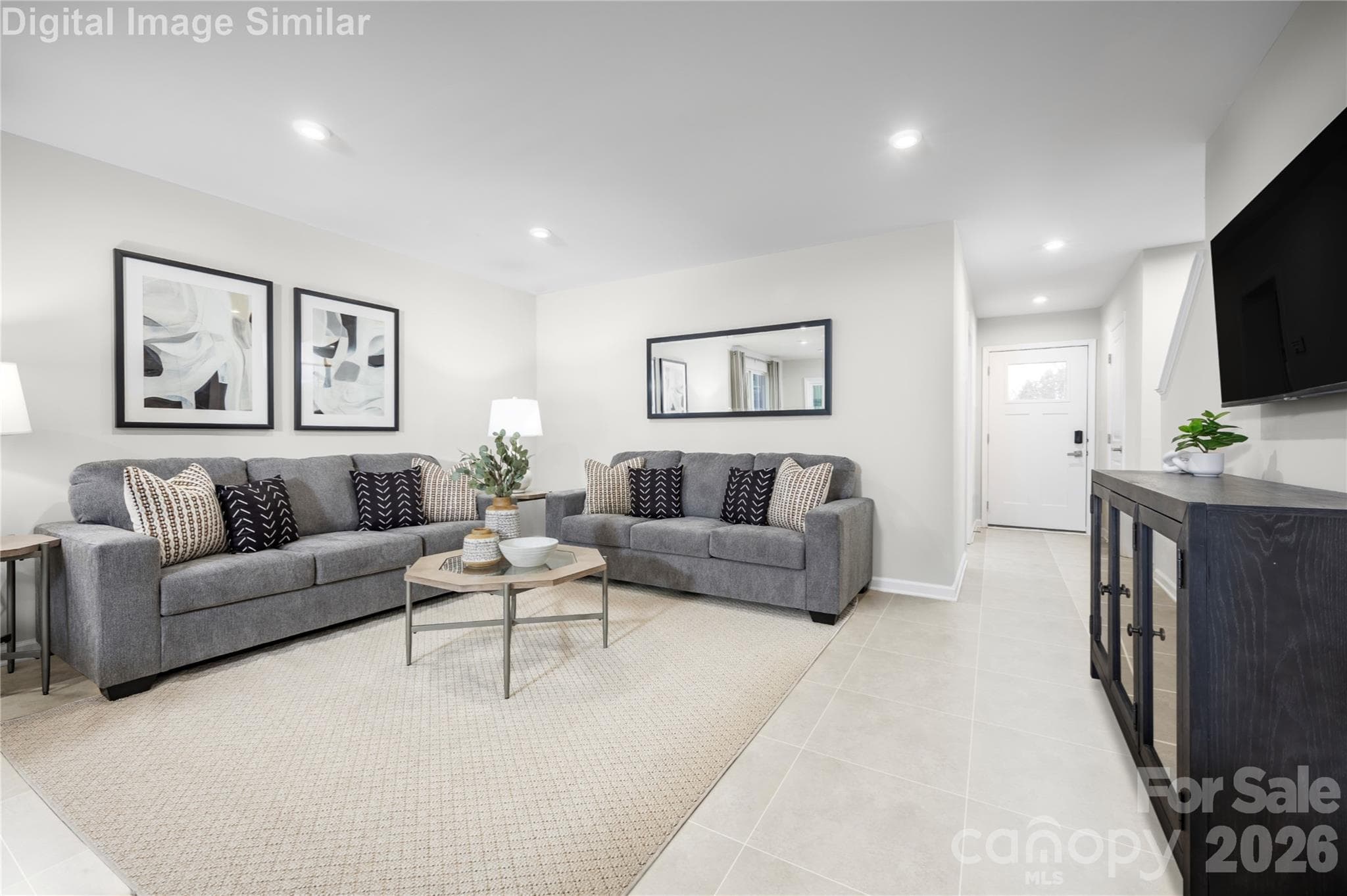 Unwind and connect—this Great Room is your go-to space for movie nights, family time, and everyday memories. - 5219 Macvittie Lane, Charlotte