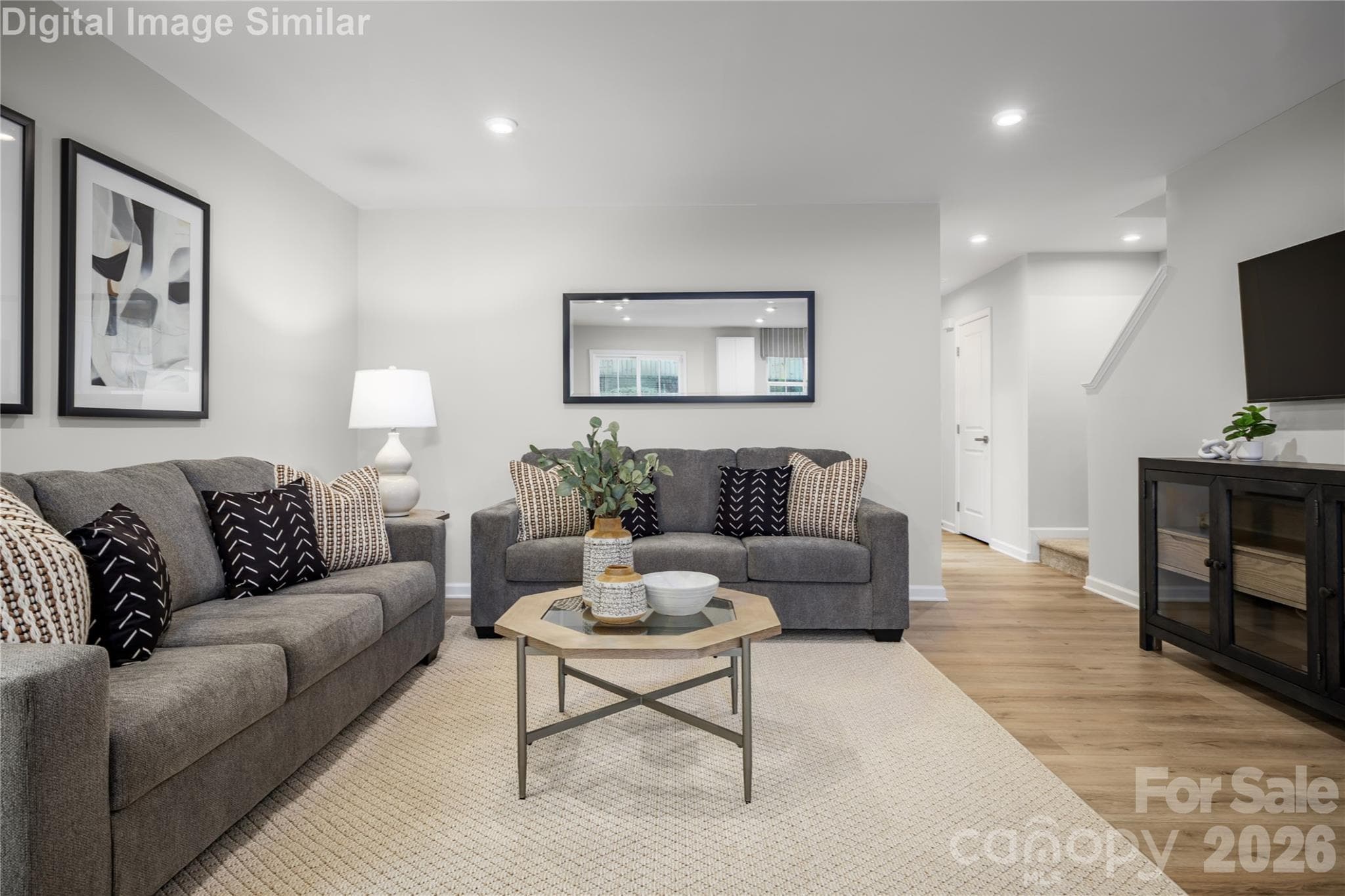 Roomy yet cozy—this inviting family space is made for relaxing, entertaining, and creating unforgettable moments. - 5219 Macvittie Lane, Charlotte