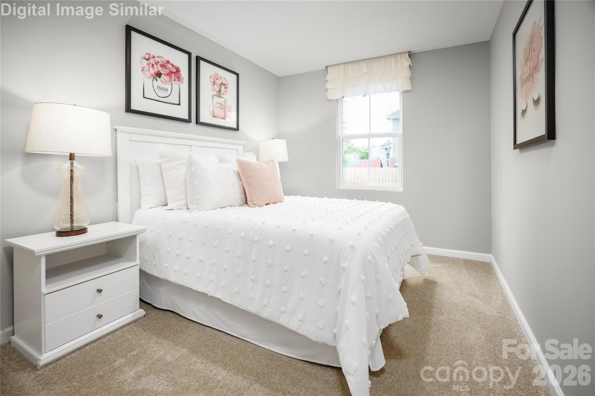 Bright and adaptable—this second bedroom offers generous closet space and endless possibilities for your unique style and needs - 5223 Macvittie Lane, Charlotte