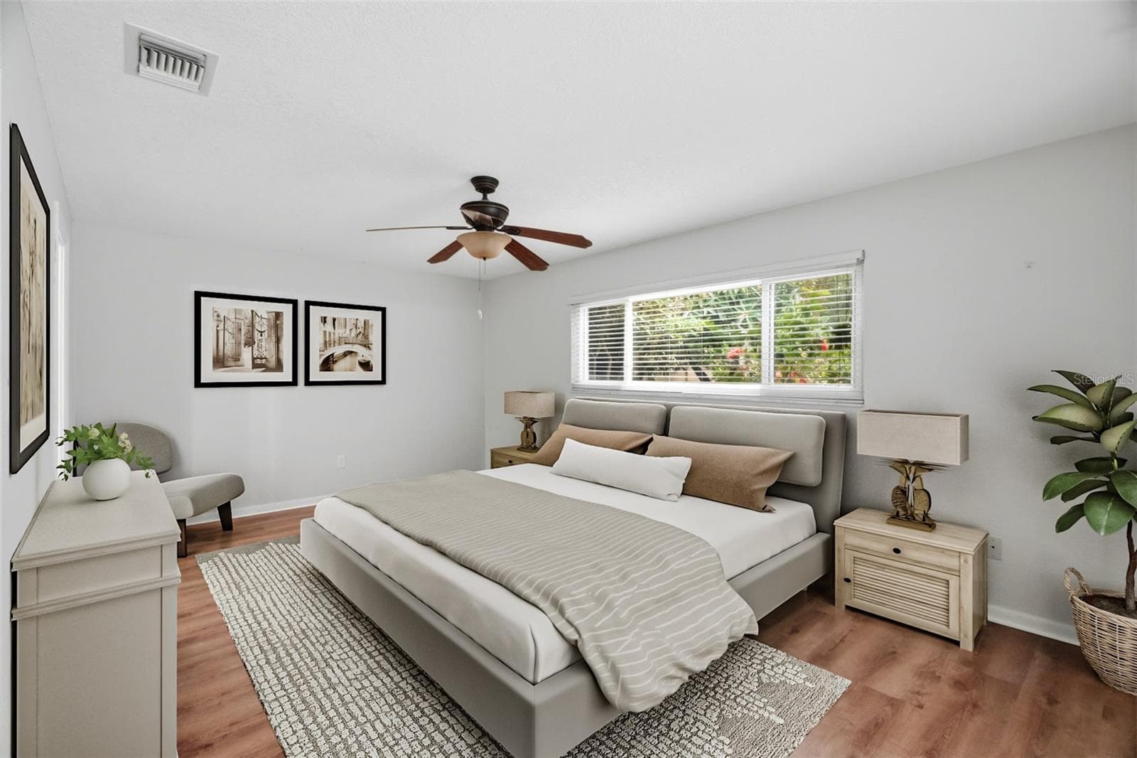 Primary retreat complete with walk in closet and ensuite bath. - 1297 PEACH TREE DR, DUNEDIN