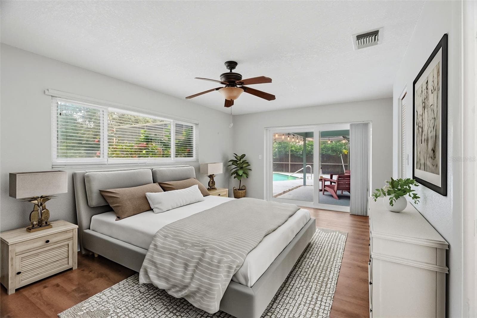 Primary retreat complete with walk in closet and ensuite bath. - 1297 PEACH TREE DR, DUNEDIN