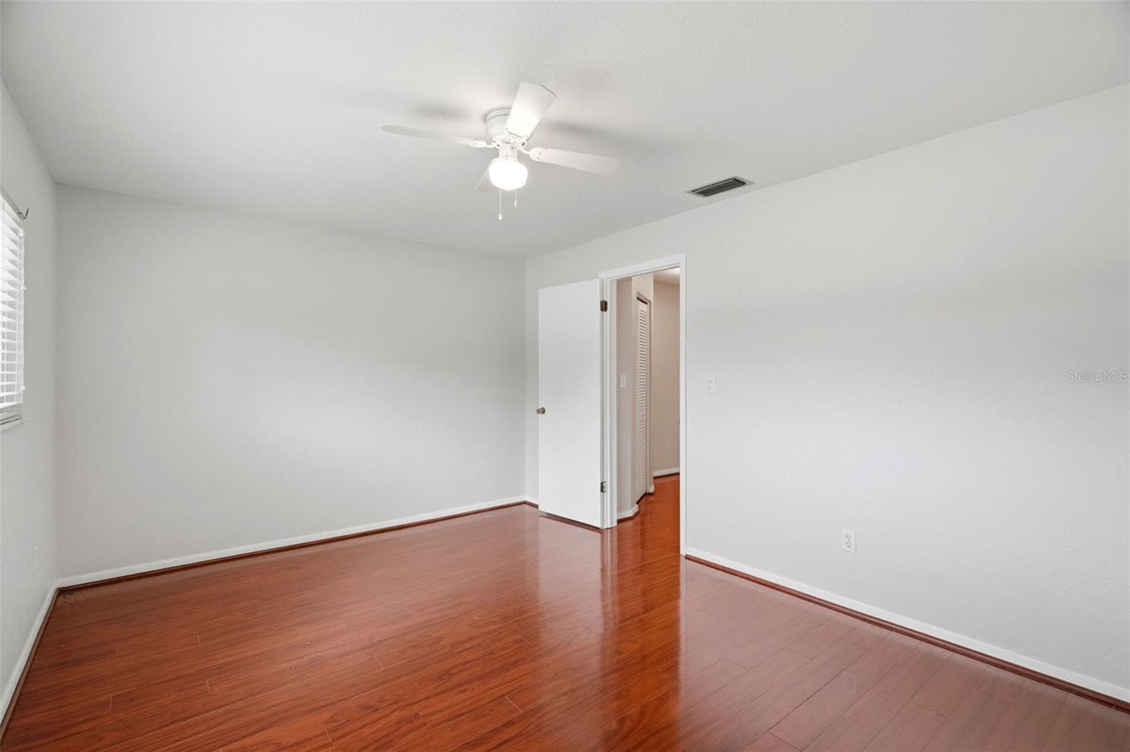 Spacious second bedroom. - 1297 PEACH TREE DR, DUNEDIN
